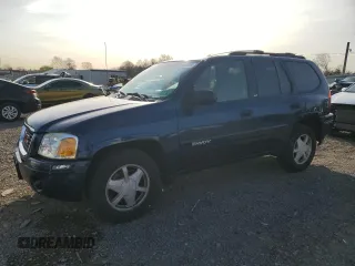 2003 GMC Envoy SLE with VIN 1GKDT13SX32318460, listed as a Copart auction lot 51370825 with 151,561 mi miles and Clean Title. Bid and sale history available at carsss.com. Image 1.