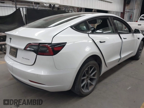 2023 Tesla Model 3 Long Range with VIN 5YJ3E1EB3PF603955, listed as a IAAI auction lot 41915541 with 33,691 mi miles and . Bid and sale history available at DreamBid. Image 4.