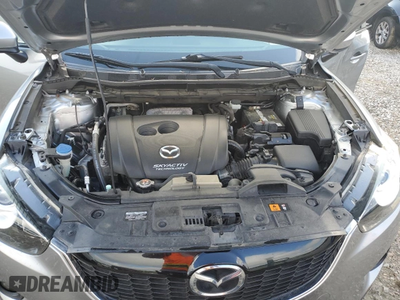 2014 Mazda CX-5 Touring z VIN JM3KE2CY0E0412733, wystawiony jako Copart lot #55803865 z przebiegiem 161 539 mil mil oraz Szkoda całkowita • Salvage title. Historia ofert i sprzedaży dostępna na DreamBid. Obrazek 12.