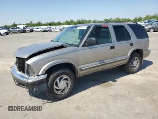 2001 Chevrolet Blazer LT z VIN 1GNDT13W012145776, wystawiony jako Copart lot #54365815 z przebiegiem 191 396 mil mil oraz Szkoda całkowita • Salvage title. Historia ofert i sprzedaży dostępna na DreamBid. Obrazek 1.