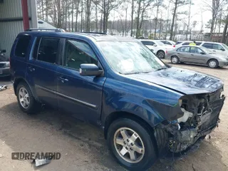 2010 Honda Pilot Touring with VIN 5FNYF4H80AB025356, listed as a IAAI auction lot 41866731 with 138,785 mi miles. Bid and sale history available at carsss.com. Image 1.