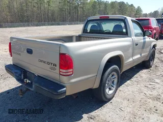 2003 Dodge Dakota with VIN 1D7FL16X13S358492, listed as a IAAI auction lot 41903051 with 151,162 mi miles. Bid and sale history available at carsss.com. Image 4.