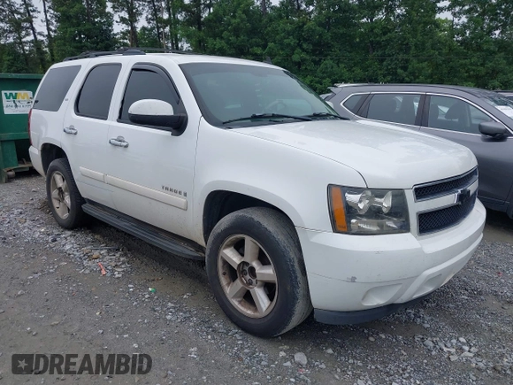 2007 Chevrolet Tahoe LT with VIN 1GNFC13007R415013, listed as a IAAI auction lot 42370633 with 302,992 mi miles and . Bid and sale history available at DreamBid. Image 1.