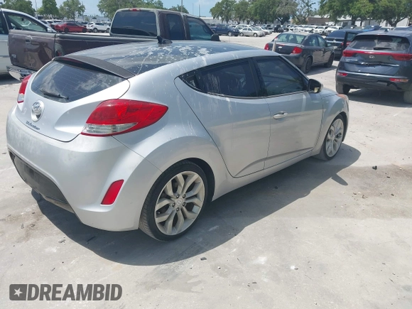 2012 Hyundai Veloster w/Gray Int with VIN KMHTC6ADXCU028115, listed as a IAAI auction lot 42361550 with 118,920 mi miles and . Bid and sale history available at DreamBid. Image 4.