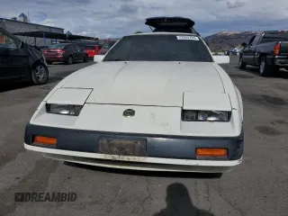 1985 Nissan 300ZX z VIN JN1HZ16S9FX050874, wystawiony jako Copart lot #72283704 z przebiegiem 139 895 mil mil oraz Tytuł czysty. Historia ofert i sprzedaży dostępna na DreamBid. Obrazek 5.