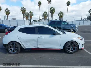 2019 Hyundai Veloster N with VIN KMHT36AH6KU001916, listed as a IAAI auction lot 41577775 with 77,471 mi miles. Bid and sale history available at carsss.com. Image 13.