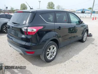 2017 Ford Escape SE with VIN 1FMCU0GD3HUC91104, listed as a IAAI auction lot 42142522 with 107,147 mi miles. Bid and sale history available at carsss.com. Image 4.