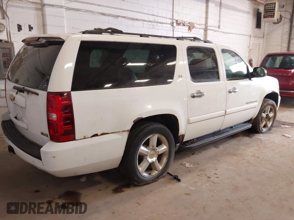 2007 Chevrolet Suburban LT with VIN 1GNFK16387J352797, listed as a IAAI auction lot 42310897 with 208,836 mi miles and . Bid and sale history available at DreamBid. Image 4.