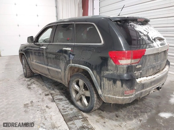 2011 Jeep Grand Cherokee Overland Summit with VIN 1J4RR6GT5BC702214, listed as a IAAI auction lot 41368605 with 183,068 mi miles. Bid and sale history available at carsss.com. Image 3.
