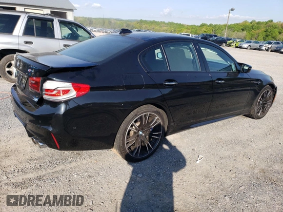 2018 BMW M5 z VIN WBSJF0C5XJB282107, wystawiony jako Copart lot #49979943 z przebiegiem 55 243 mil mil oraz . Historia ofert i sprzedaży dostępna na DreamBid. Obrazek 3.