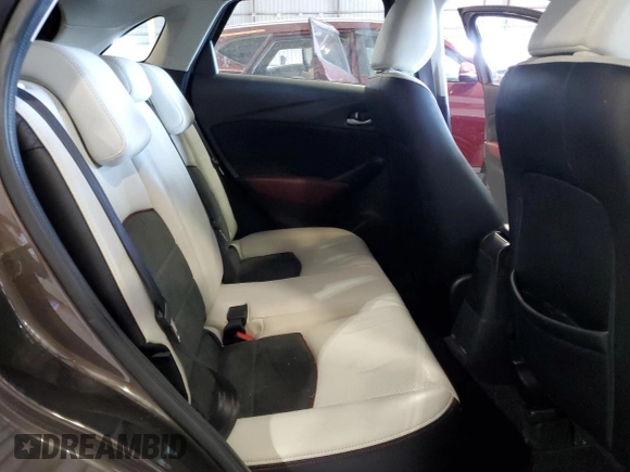 2017 Mazda CX-3 Grand Touring z VIN JM1DKFD74H0163736, wystawiony jako Copart lot #57871265 z przebiegiem 212 515 mil mil oraz Szkody całkowita. Historia ofert i sprzedaży dostępna na DreamBid. Obrazek 10.