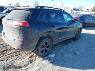 2018 Jeep Cherokee Latitude with VIN 1C4PJMCX8JD601680, listed as a IAAI auction lot 41442741 with 174,519 mi miles. Bid and sale history available at carsss.com. Image 4.