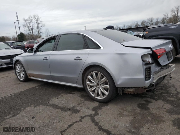 2017 Audi A8 L with VIN WAU44AFDXHN012948, listed as a Copart auction lot 84748154 with 77,086 mi miles and Salvage Title. Bid and sale history available at carsss.com. Image 2.