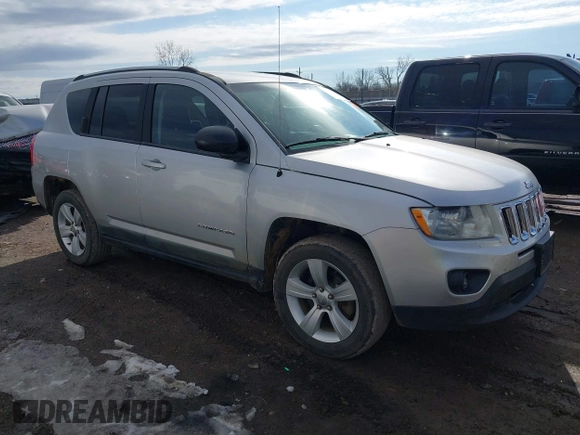2011 Jeep Compass with VIN 1J4NT1FB4BD252724, listed as a IAAI auction lot 41247389 with 162,028 mi miles. Bid and sale history available at carsss.com. Image 1.