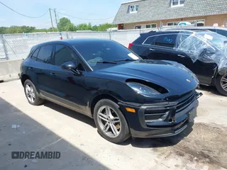 2022 Porsche Macan with VIN WP1AA2A51NLB05822, listed as a IAAI auction lot 39567077 with 54,527 mi miles. Bid and sale history available at carsss.com. Image 1.