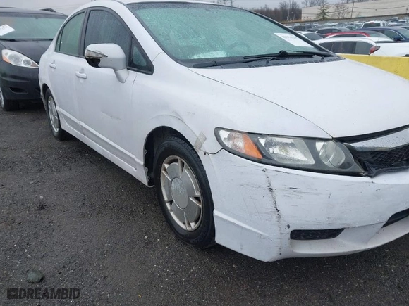 2010 Honda Civic Hybrid with VIN JHMFA3F23AS005117, listed as a IAAI auction lot 41956295 with 211,151 mi miles. Bid and sale history available at carsss.com. Image 12.