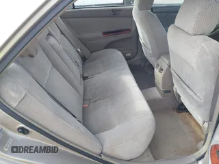 2003 Toyota Camry LE with VIN 4T1BE30K83U176834, listed as a IAAI auction lot 41307922 with 182,019 mi miles and . Bid and sale history available at DreamBid. Image 8.