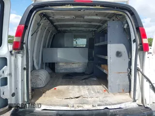 2014 Chevrolet Express Cargo Van with VIN 1GCWGFFA2E1103446, listed as a IAAI auction lot 42177760 with 91,232 mi miles. Bid and sale history available at carsss.com. Image 8.