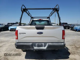 2016 Ford F-150 XL with VIN 1FTMF1C86GKD33700, listed as a Copart auction lot 48743235 with 104,561 mi miles and Salvage title. Bid and sale history available at DreamBid. Image 6.