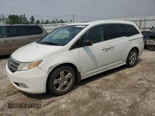 2011 Honda Odyssey Touring с VIN 5FNRL5H95BB503218, выставлен на аукционе Copart как лот 59372735 с пробегом 224 481 миль миль и Списание • Salvage title. История ставок и продаж доступна на DreamBid. Изображение 1.