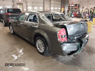 2010 Chrysler 300 Touring with VIN 2C3CA5CV9AH101800, listed as a IAAI auction lot 42015640 with 128,457 mi miles and . Bid and sale history available at DreamBid. Image 3.