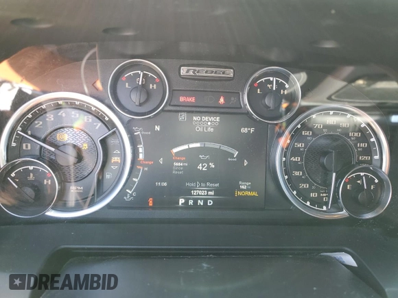 2017 Ram 1500 Rebel z VIN 1C6RR6YT2HS693644, wystawiony jako Copart lot #52570215 z przebiegiem 127 023 mil mil oraz Nie do naprawy • Non repairable. Historia ofert i sprzedaży dostępna na DreamBid. Obrazek 9.