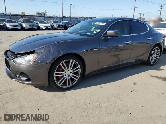 2016 Maserati Ghibli S Q4 z VIN ZAM57RTA8G1173582, wystawiony jako Copart lot #48792615 z przebiegiem Nie podano mil oraz Szkoda całkowita • Salvage title. Historia ofert i sprzedaży dostępna na DreamBid. Obrazek 1.