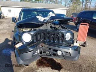 2016 Jeep Patriot Sport with VIN 1C4NJPBAXGD699514, listed as a IAAI auction lot 41945662 with 100,111 mi miles. Bid and sale history available at carsss.com. Image 6.