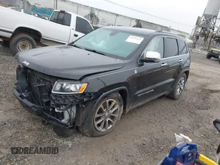 2014 Jeep Grand Cherokee Limited with VIN 1C4RJFBG2EC279944, listed as a IAAI auction lot 41591623 with 150,588 mi miles and . Bid and sale history available at DreamBid. Image 17.