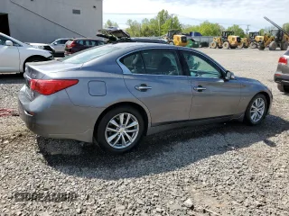 2014 Infiniti Q50 Sport with VIN JN1BV7ARXEM701051, listed as a Copart auction lot 55157825 with 192,418 mi miles and Salvage title. Bid and sale history available at DreamBid. Image 3.