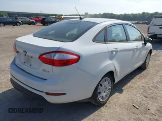 2014 Ford Fiesta S z VIN 3FADP4AJXEM211776, wystawiony jako IAAI lot #42574815 z przebiegiem 174 043 mil mil oraz . Historia ofert i sprzedaży dostępna na DreamBid. Obrazek 4.