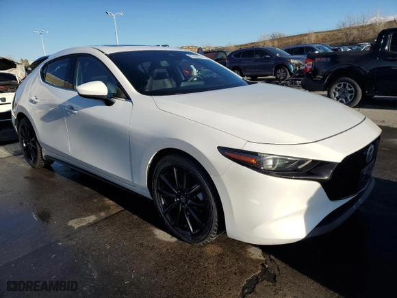 2019 Mazda Mazda3 Hatchback w/Premium Pkg with VIN JM1BPANM4K1125215, listed as a Copart auction lot 87286954 with 65,404 mi miles and Salvage Title. Bid and sale history available at carsss.com. Image 4.