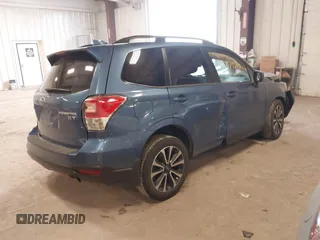2018 Subaru Forester Premium with VIN JF2SJGECXJH606668, listed as a IAAI auction lot 41879710 with 64,910 mi miles. Bid and sale history available at carsss.com. Image 4.