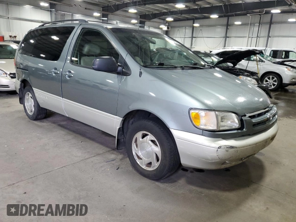 2000 Toyota Sienna LE z VIN 4T3ZF13C7YU284445, wystawiony jako Copart lot #52452465 z przebiegiem 150 609 mil mil oraz Szkoda całkowita • Salvage title. Historia ofert i sprzedaży dostępna na DreamBid. Obrazek 4.