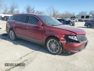 2015 Lincoln MKT EcoBoost with VIN 2LMHJ5AT0FBL01008, listed as a Copart auction lot 47419575 with 181,670 mi miles and Salvage Title. Bid and sale history available at DreamBid. Image 4.