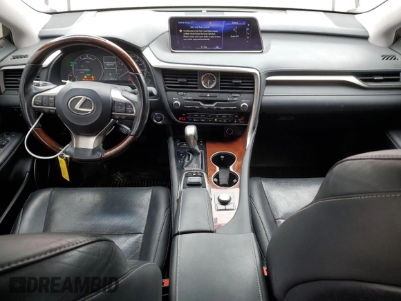 2018 Lexus RX 450hL Premium with VIN JTJDGKCA5J2002701, listed as a Copart auction lot 60258935 with 73,437 mi miles and Salvage title. Bid and sale history available at DreamBid. Image 8.