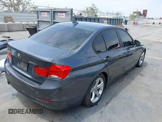 2014 BMW 3 Series 320i xDrive with VIN WBA3C3C58EP661414, listed as a IAAI auction lot 42489010 with 93,488 mi miles and . Bid and sale history available at DreamBid. Image 4.