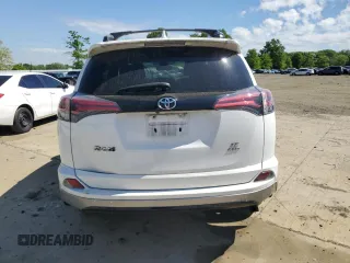 2018 Toyota RAV4 SE with VIN 2T3JFREV9JW801731, listed as a Copart auction lot 55866485 with 64,043 mi miles and Salvage title. Bid and sale history available at DreamBid. Image 6.