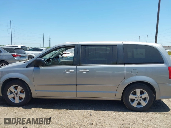 2013 Dodge Grand Caravan SE with VIN 2C4RDGBG0DR702913, listed as a IAAI auction lot 42007786 with 163,981 mi miles and . Bid and sale history available at DreamBid. Image 14.