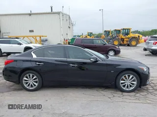 2015 Infiniti Q50 Premium with VIN JN1BV7AR8FM396828, listed as a IAAI auction lot 42313019 with 130,707 mi miles and . Bid and sale history available at DreamBid. Image 12.