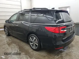 2022 Honda Odyssey Touring with VIN 5FNRL6H88NB051038, listed as a Copart auction lot 56995315 with 108,534 mi miles and Salvage title. Bid and sale history available at DreamBid. Image 2.