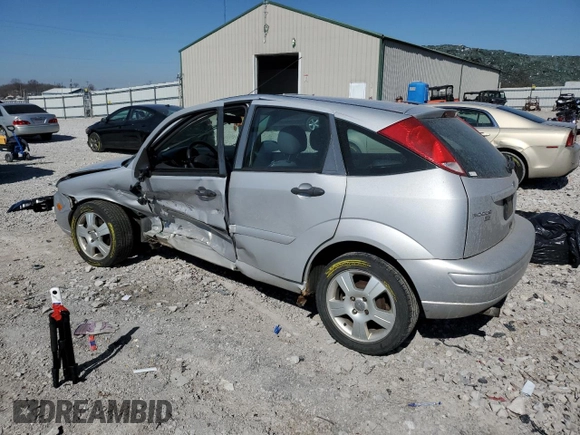 2007 Ford Focus S with VIN 1FAHP37N77W342091, listed as a Copart auction lot 48664305 with 120,661 mi miles and Salvage Title. Bid and sale history available at carsss.com. Image 2.
