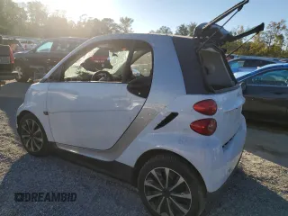 2010 Smart fortwo Pure с VIN WMEEJ3BA4AK363015, выставлен на аукционе Copart как лот 76066204 с пробегом Не указан миль и Списание • Salvage title. История ставок и продаж доступна на DreamBid. Изображение 2.
