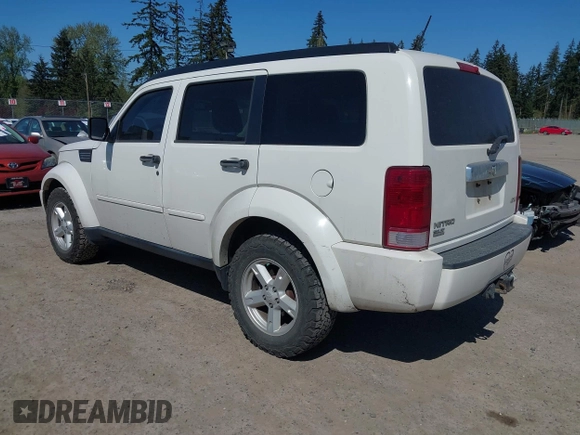 2007 Dodge Nitro SLT z VIN 1D8GU58K07W586777, wystawiony jako IAAI lot #42043802 z przebiegiem 143 324 mil mil oraz . Historia ofert i sprzedaży dostępna na DreamBid. Obrazek 3.
