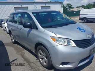 2014 Toyota Sienna L with VIN 5TDZK3DC9ES518653, listed as a IAAI auction lot 42767591 with 261,730 mi miles and . Bid and sale history available at DreamBid. Image 1.