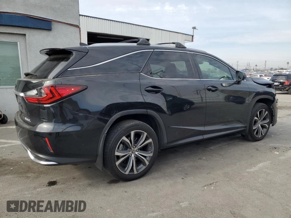 2022 Lexus RX with VIN JTJHZKEA3N2025909, listed as a Copart auction lot 43642535 with 30,563 mi miles and Salvage Title. Bid and sale history available at carsss.com. Image 3.