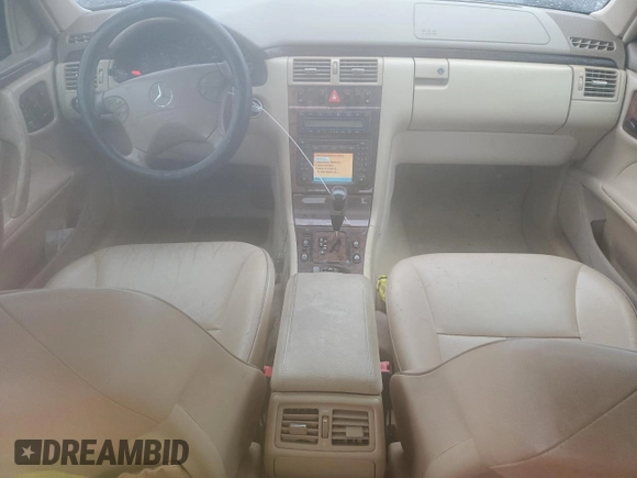 2002 Mercedes-Benz E 320 with VIN WDBJF82J22X070566, listed as a Copart auction lot 55964535 with 238,240 mi miles and Salvage Title. Bid and sale history available at DreamBid. Image 8.