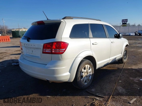 2017 Dodge Journey SE z VIN 3C4PDCAB3HT707029, wystawiony jako IAAI lot #41406306 z przebiegiem 104 046 mil mil oraz . Historia ofert i sprzedaży dostępna na DreamBid. Obrazek 4.