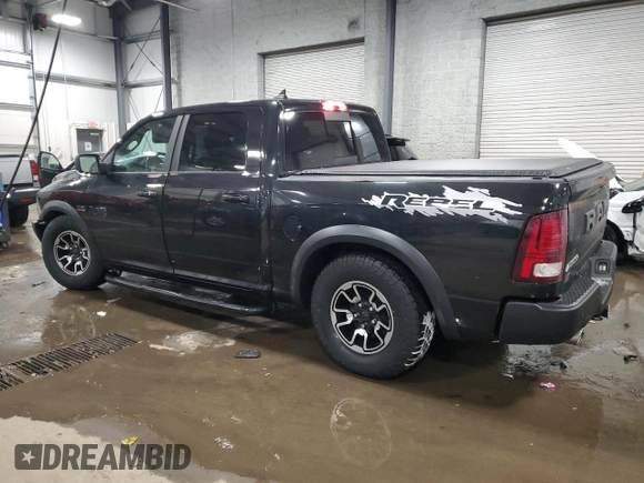 2018 Ram 1500 Rebel with VIN 1C6RR7YT8JS180068, listed as a Copart auction lot 44908605 with 123,408 mi miles and Salvage Title. Bid and sale history available at carsss.com. Image 2.