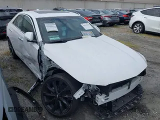 2023 Cadillac CT4 Luxury z VIN 1G6DJ5RK3P0113745, wystawiony jako IAAI lot #41831036 z przebiegiem 16 560 mil mil oraz . Historia ofert i sprzedaży dostępna na DreamBid. Obrazek 1.